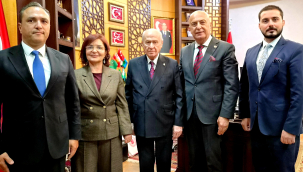 Prof. Dr. Aygün Attar başkanlığındaki heyet, MHP Lideri Devlet Bahçeli'yi ziyaret etti. 