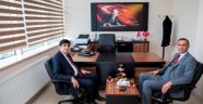 Rektör Alma, (OSB) Müdürü Hakan Aras'ı Ziyaret Etti .